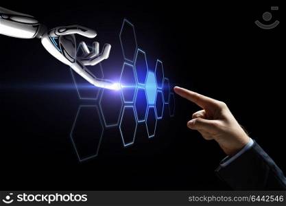 future technology, artificial intelligence and business concept - robot and human hand touching virtual network hologram over black background. robot and human hand touching network hologram