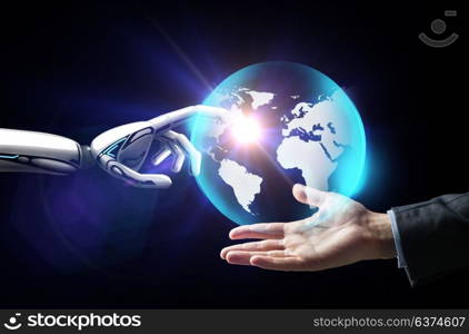 future technology, business and artificial intelligence concept - close up of businessman hand and robot touching virtual earth hologram over black background. human and robot hand with virtual earth hologram