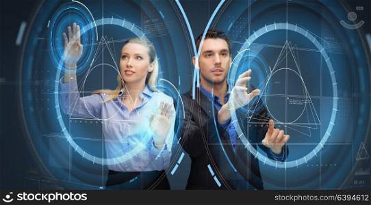future technology, business and people concept - businessman and businesswoman using virtual screen projections. business people using virtual screen projections