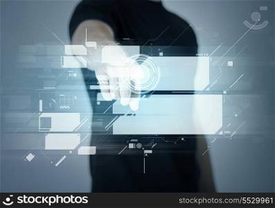 future technology - closeup of man pointing his finger at virtual screen