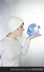 futuristic fashion profile woman shout to blue fish angry gesture silver background