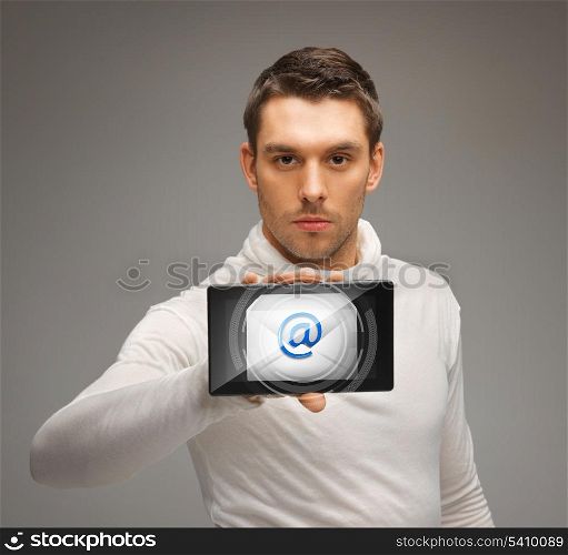 futuristic man holding tablet pc with email icon