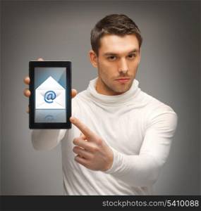 futuristic man pointing at tablet pc with email icon
