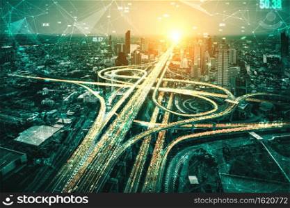 Futuristic road transportation technology with digital data transfer graphic showing concept of traffic big data analytic and internet of things .. Futuristic road transportation technology with digital data transfer graphic