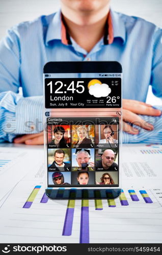 Futuristic Smart phone (phablet) with a transparent display in human hands. Concept actual future innovative ideas and best technologies humanity.