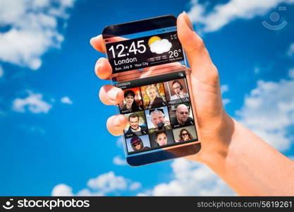 Futuristic Smart phone (phablet) with a transparent display in human hands. Concept actual future innovative ideas and best technologies humanity.