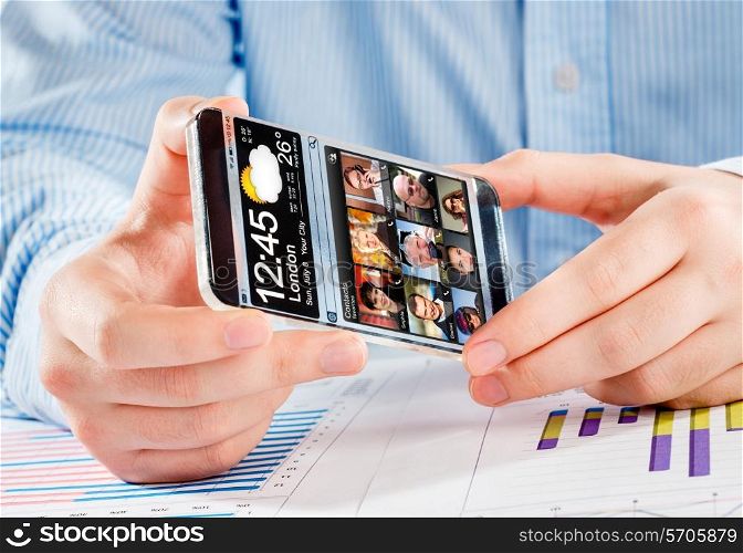 Futuristic Smart phone (phablet) with a transparent display in human hands. Concept actual future innovative ideas and best technologies humanity.