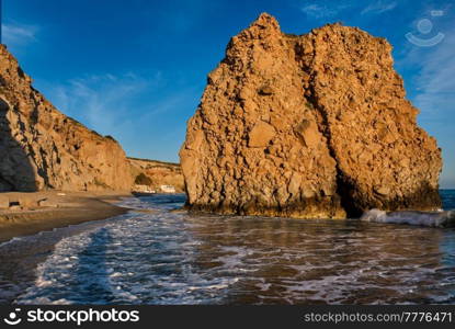 Fyriplaka beach and waves of Aegean sea on sunset, Milos island, Cyclades, Greece. Fyriplaka beach on sunset, Milos island, Cyclades, Greece