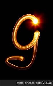 G - Created by light alphabet over black background