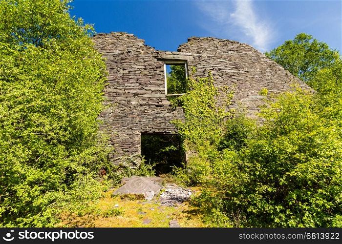 Gable end of ruined slate mill. Dorothea Slate Quarry, Nantlle, Gwynedd, Wales, United Kingdom