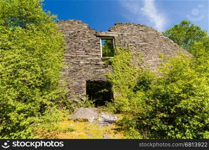 Gable end of ruined slate mill. Dorothea Slate Quarry, Nantlle, Gwynedd, Wales, United Kingdom