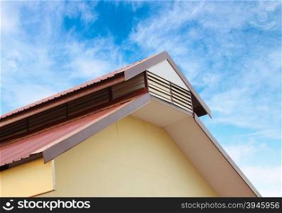gable roof against a blue sky