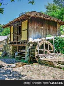 Gabrovo, Etar, Bulgaria - 07.27.2019. Water mill in the Etar Architectural Ethnographic Complex in Bulgaria on a sunny summer day. Big size panoramic photo.. Water mill in the Etar village, Bulgaria