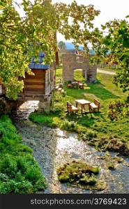 Gacka river spring watermill and historic ruins, Croatia