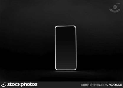 gadget, technology and electronics concept - smartphone with blank screen on black background. smartphone with blank screen on black background