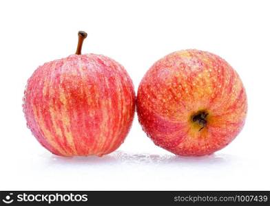 gala apples with drops of water on white background