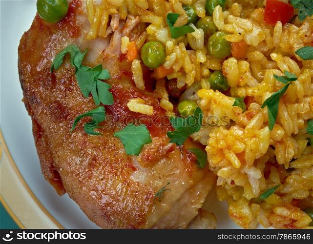 Galinhada - stew chicken, typical Brazilian dish. rice made with chicken, saffron, and vegetables,