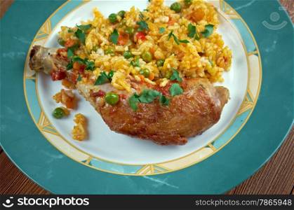 Galinhada - stew chicken, typical Brazilian dish. rice made with chicken, saffron, and vegetables,