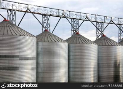 Galvenised Iron grain silos on a farm in Western New South Wales, Australia