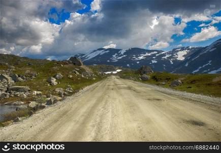gamle strynefjellsvegen road one of the most beautifull auto roads in norway with snow in summer