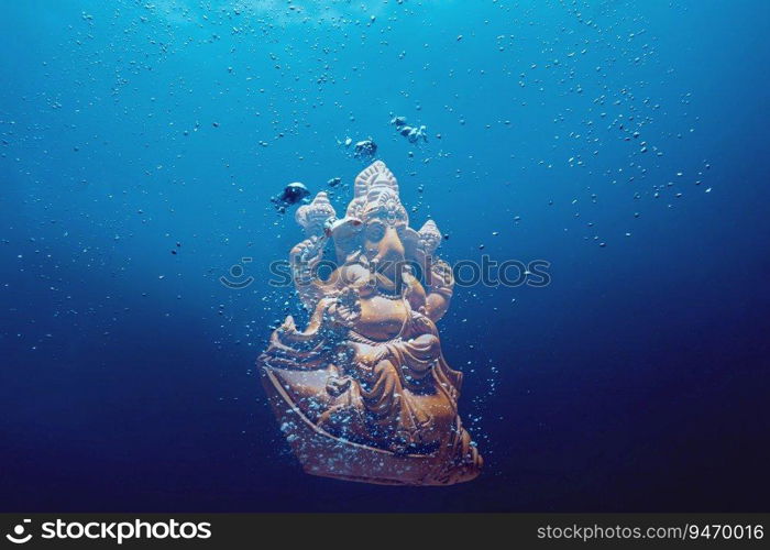 ganesh idol submerged in water