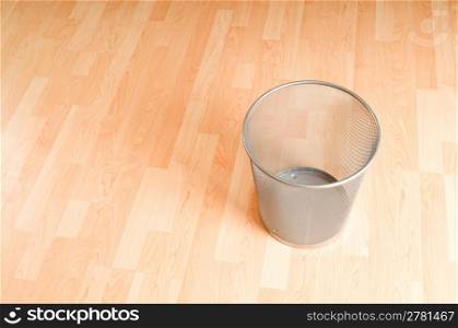 Garbage bin with paper waste isolated on white