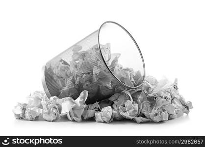 Garbage bin with paper waste isolated on white