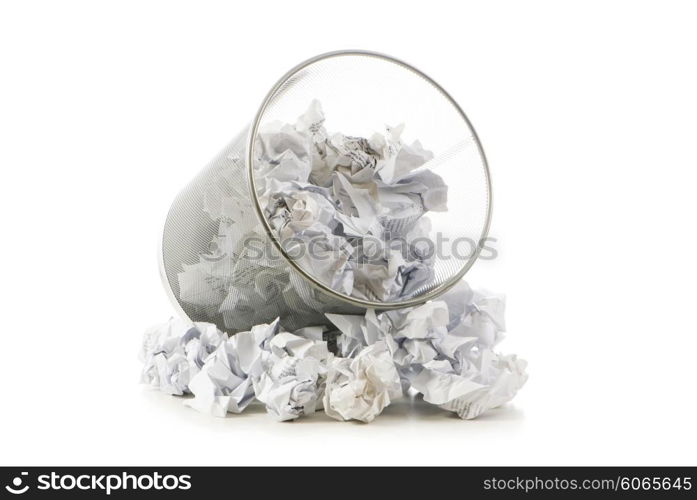 Garbage bin with paper waste isolated on white