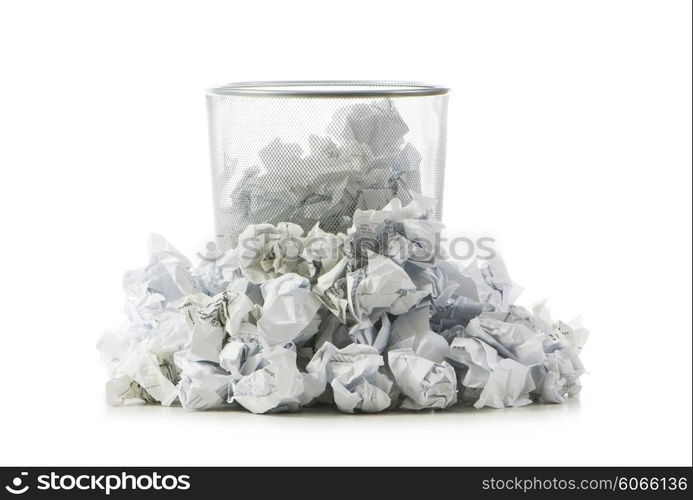 Garbage bin with paper waste isolated on white