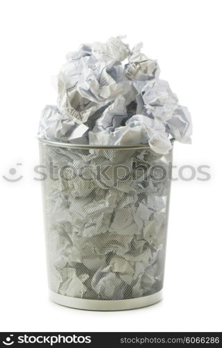 Garbage bin with paper waste isolated on white