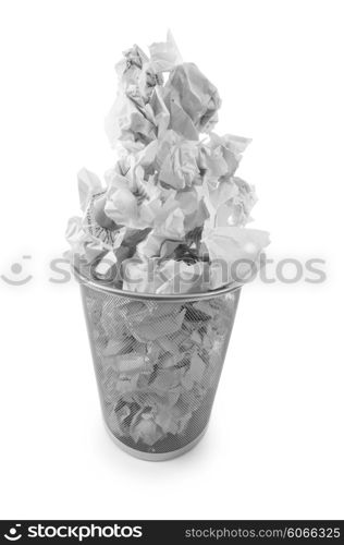 Garbage bin with paper waste isolated on white