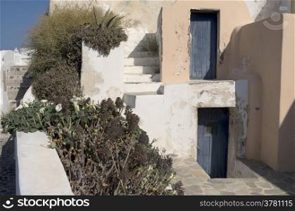 Garden en house in Thira on Santorini in Greece.