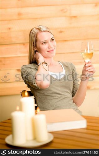 Garden happy woman enjoy glass of wine sitting on terrace