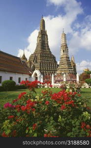 Garden in front of a temple, Wat Arun, Bangkok, Thailand