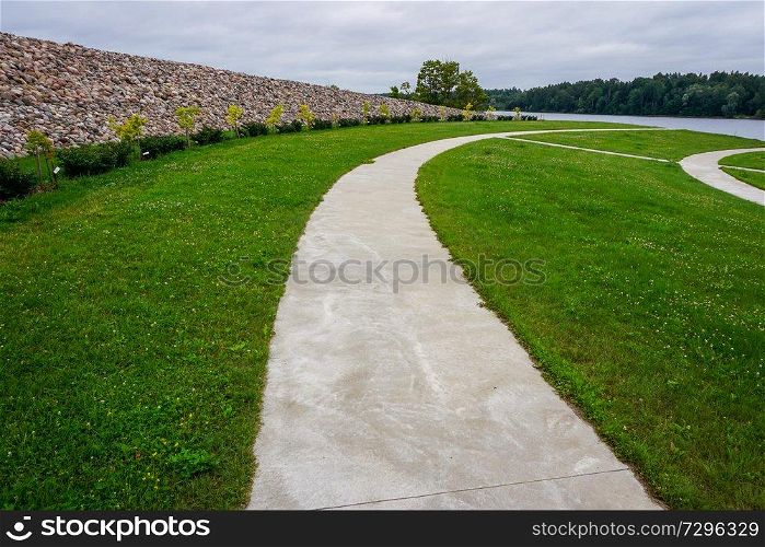 Garden of Destinies is a monumental architectural ensemble on the Daugava Island in Koknese. Scenery of stones and way in Koknese in the park Garden of Destinies in Latvia. Garden in Koknese.