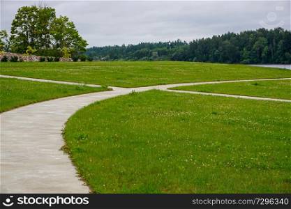 Garden of Destinies is a monumental architectural ensemble on the Daugava Island in Koknese. Scenery of stones and meadow in Koknese in the park Garden of Destinies in Latvia. Garden in Koknese.