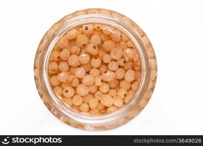 garden white currant in juice on top open glass can