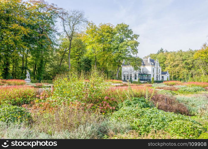 Garden with flowerbeds by castle Staverden in The Netherlands.