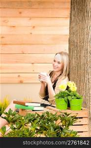 Garden woman terrace enjoy rest with cup coffee plant