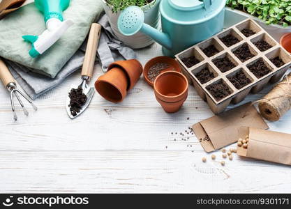 Gardening concept, planting at home.  Set of gardening tools and supplies for sowing seeds