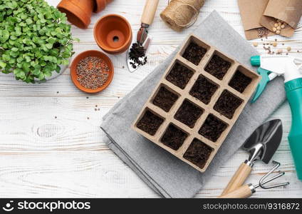 Gardening concept, planting at home.  Set of gardening tools and supplies for sowing seeds