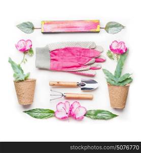 Gardening flat lay with pink flowers, pots and gardening tools on white background, top view