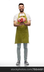 gardening, floristry and people concept - happy smiling male gardener in apron with bunch of peony flowers over white background. smiling male gardener with bunch of peony flowers