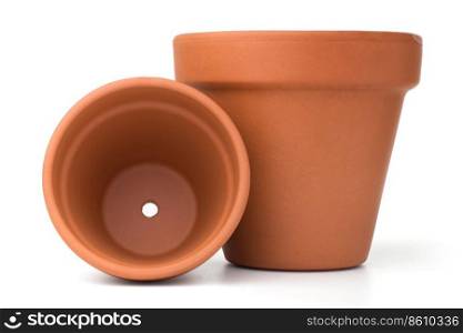Gardening: group of empty ceramic flower pots, isolated on white background. Empty ceramic flower pots