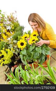 Gardening - portrait of woman with sunflowers on white background