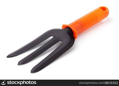 Gardening: single small digging fork, isolated on white background. Digging fork
