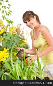 Gardening - smiling woman holding flower pot with sunflower on white background