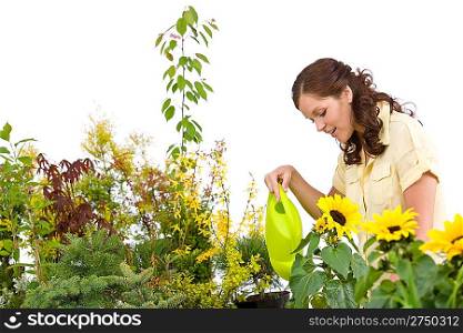 Gardening - Woman pouring water to plants with watering can on white background