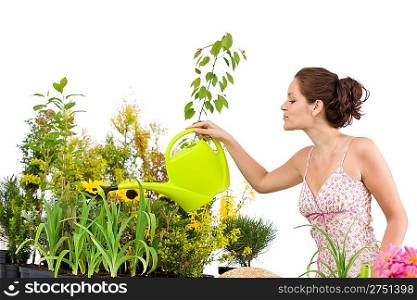 Gardening - Woman pouring water to plants with watering can on white background