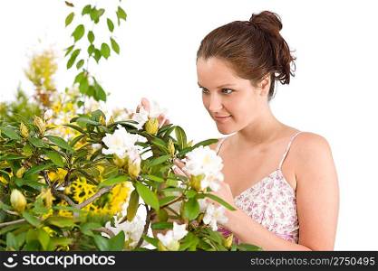 Gardening - Woman with Rhododendron flower blossom on white background